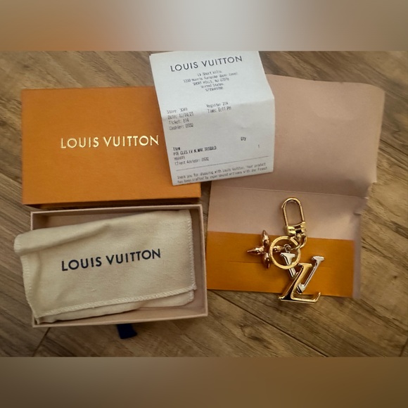 Louis Vuitton key chain/ bag charm brand new never used with receipt! - Picture 3 of 5